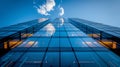 Modern office building with blue sky, and glass facades. Royalty Free Stock Photo