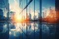 Modern office building or business center Tall buildings' windows made of glass reflect clouds and sunlight. Empty