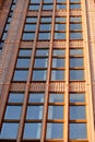 Modern office building, detailed view of finance house windows. Pattern. Office building, blue glass wall reflection detail. Clear Royalty Free Stock Photo