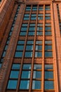 Modern office building, detailed view of finance house windows. Pattern. Office building, blue glass wall reflection detail. Clear Royalty Free Stock Photo