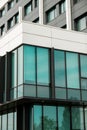Modern office building exterior with glass facade on clear sky background. Transparent glass wall of office building Royalty Free Stock Photo