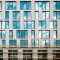 Modern office building facade front partly, with scaffolding