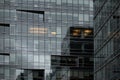 Modern office building with glass windows facade reflection sky. modern business architecture Royalty Free Stock Photo