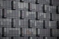 Modern office building with glass windows facade reflection sky. modern business architecture Royalty Free Stock Photo