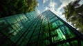 Modern office building with green glass facade and reflection Royalty Free Stock Photo