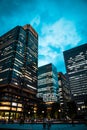 Modern office building at Marunouchi Plaza during Twilight. Portrait Orientation