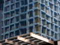 Modern Office Building Reflected in Glass Windows