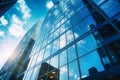 Modern office building with reflection of blue sky and clouds in glass wall Ai generative Royalty Free Stock Photo