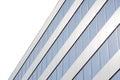 A modern office building rows of windows abstract background, isolated. Glass and metal architecture concept, wall of windows Royalty Free Stock Photo