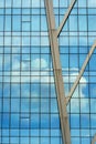 Modern office building wall made of blue glass and steel frame Royalty Free Stock Photo