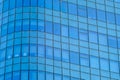 Modern office building wall made of blue glass and steel frame Royalty Free Stock Photo