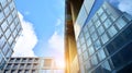 Office building, details of blue glass wall and sun reflections. Royalty Free Stock Photo