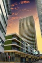 Modern buildings against a spectacular sky