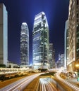 Modern office buildings in Central Hong Kong at night with traffic Royalty Free Stock Photo