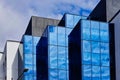Modern Office Buildings, Blue Sky Reflected in Glass facades