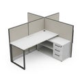 Modern office cubicle workstation with white desk and beige partitions on a white background Royalty Free Stock Photo