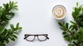 Modern office desk mockup with glasses, coffee cup, minimalist top view and soft lighting