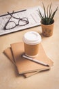 Modern office desk table with laptop computer, notepad, tablet, plant, glasses and pen Royalty Free Stock Photo