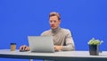 Modern Office Green Screen Background: Young Businessman Sitting at His Desk Working on a Laptop C Royalty Free Stock Photo