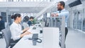 In Modern Office: Handsome Black Manager Flirts with Beautiful Female Business Specialists Working Royalty Free Stock Photo