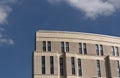 Modern office or hotel building against blue sky. Royalty Free Stock Photo