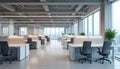 Modern office interior features rows of empty cubicles with white desks, black ergonomic chairs. Large windows offer city skyline Royalty Free Stock Photo