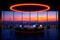 modern office conference room with illuminated circular ceiling light and panoramic cityscape view at sunset Royalty Free Stock Photo