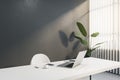 office interior with mock up place, workplace desk, laptop, chair, decorative plant, blinds and daylight. 3D Rendering Royalty Free Stock Photo