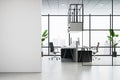 Modern office interior with workspace, large windows, city view, plants, and empty wall. Concept of a workplace. 3D Rendering Royalty Free Stock Photo