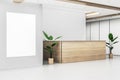 Modern office lobby interior with empty white mock up banner and wooden reception desk. Royalty Free Stock Photo