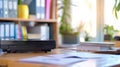 Modern office scanner on a bright and spacious desk in sunlit workspace setting. concept of efficient technology, workplace Royalty Free Stock Photo