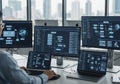 Modern office setting with multiple monitors displaying complex Royalty Free Stock Photo