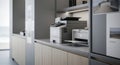 Modern office setup with multifunction printer and scanner on a grey countertop Royalty Free Stock Photo