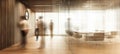 The modern office space featuring blurred professionals and elegant design. AI generated image Royalty Free Stock Photo