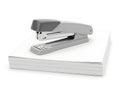 Modern office stapler on stack of paper Royalty Free Stock Photo