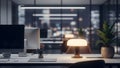 Modern office workspace with computer and lamp at night Royalty Free Stock Photo