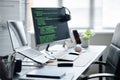 Modern Office Workspace Featuring Computer Monitor Displaying Programming Code Royalty Free Stock Photo