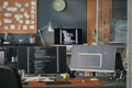 Modern Office Workspace Featuring Computer Monitors Displaying Programming Code Royalty Free Stock Photo