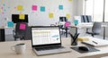 Modern Office Workspace with Laptop and Colorful Sticky Notes Royalty Free Stock Photo