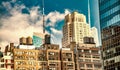 Modern and old buildings of Manhattan under a blue winter sky, New York City Royalty Free Stock Photo