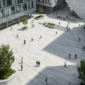A modern, open courtyard features a spacious, light-colored stone plaza with Royalty Free Stock Photo