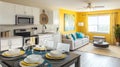 Modern open-plan apartment kitchen, dining, and living area with yellow wall Royalty Free Stock Photo