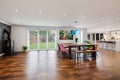 Modern open plan kitchen dining room with bifold doors Royalty Free Stock Photo