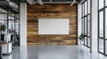 Modern Open Plan Office With Blank Canvas, Wooden Wall, Large Windows, and Concrete Floor Royalty Free Stock Photo