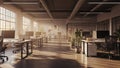 Modern Open Plan Office Interior with Sunlight Streaming Through Large Windows and Rows of Desks Royalty Free Stock Photo