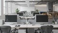 Modern open-plan office interior with desks, computers, chairs, and break area Royalty Free Stock Photo