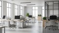 Modern Open Plan Office Interior with Desks Computers and Natural Light from Large Windows Royalty Free Stock Photo