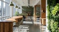 Modern open plan office interior with natural light and a living green wall Royalty Free Stock Photo