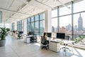 Modern open-plan office with natural light Royalty Free Stock Photo