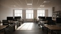 Modern Open Plan Office Space with Rows of Desks Computers and Natural Light Streaming Through Large Windows Royalty Free Stock Photo